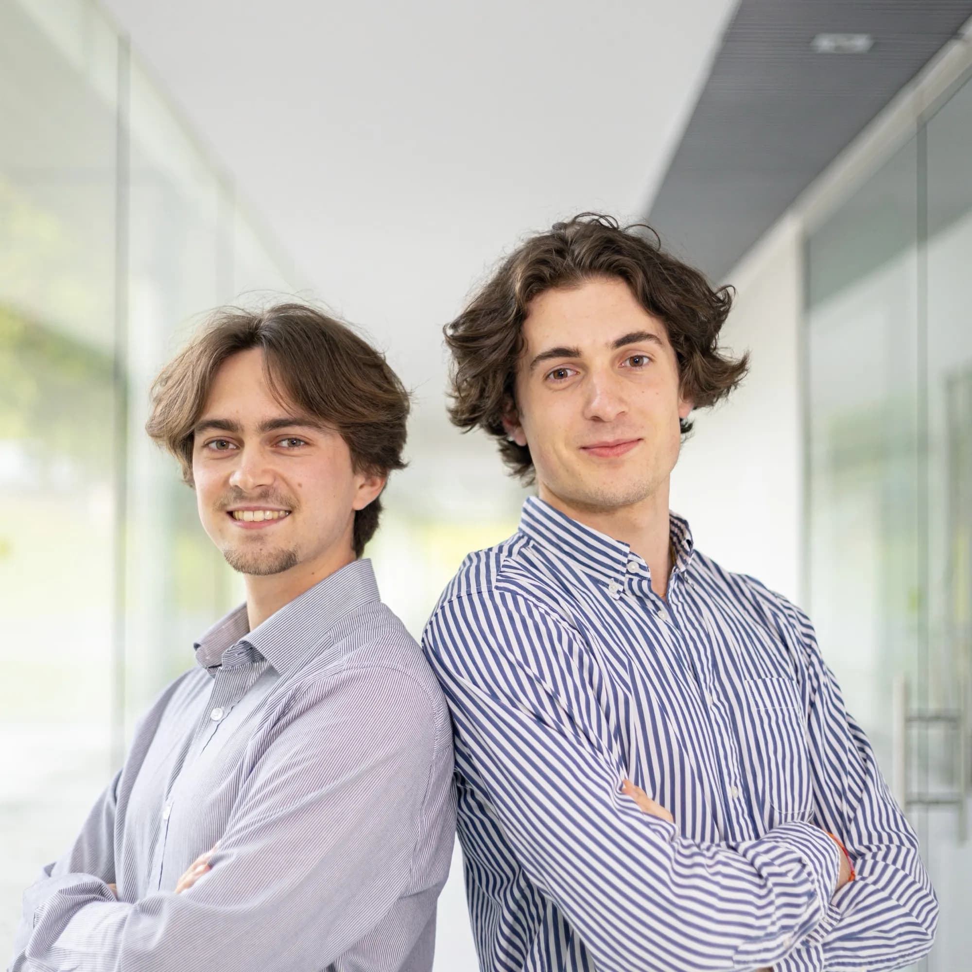 Jérémie and Arthur in shirts at their startup